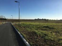 Terrain à bâtir à Croignon avec tout à l'égout en lotissement